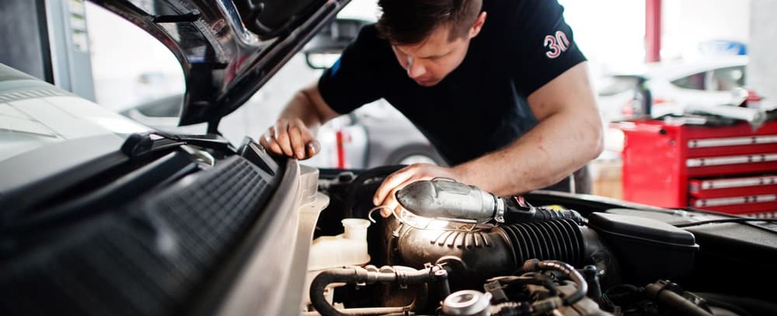 Mechanic working on a performance vehicle