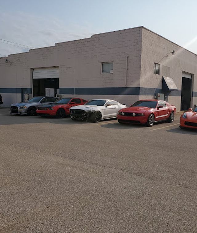 Customer cars outside the performance shop